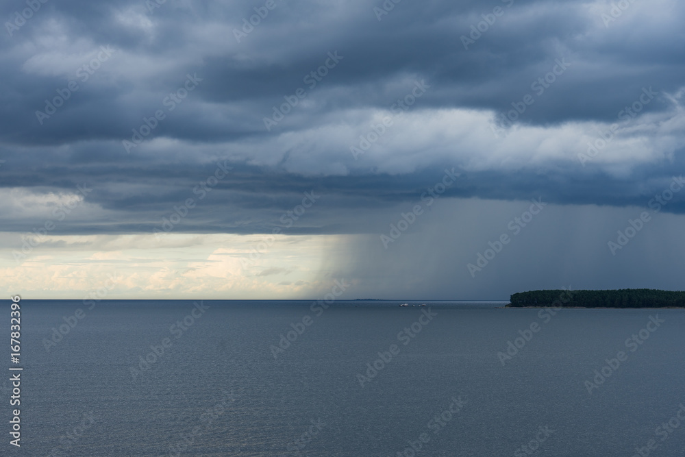 Dark clouds over dark Baltic sea.