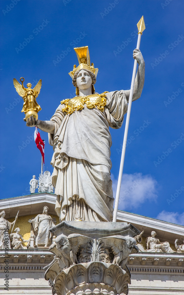 Obraz premium Statue of Pallas Athena with golden helmet near Parliament, Vienna, Austria