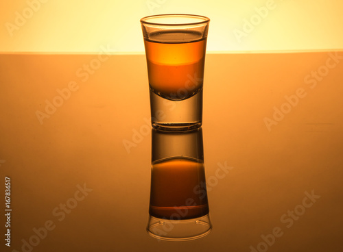 Whisky shot glass with reflections
