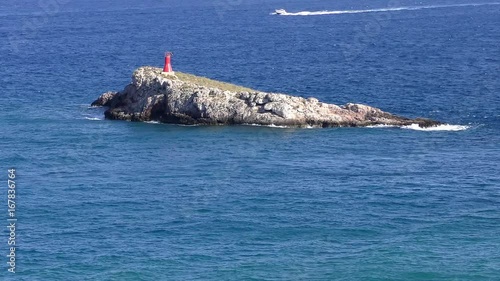 Motorboats ride on the sea in Ibiza, 4K video photo