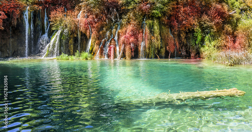 Waterfall in autumn forest at National Park Plitvice Lakes. © Denis Rozhnovsky