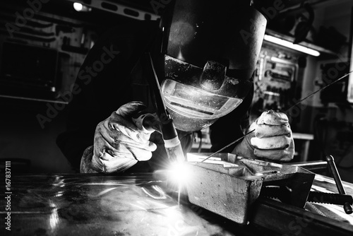 Black and white image of welder photo