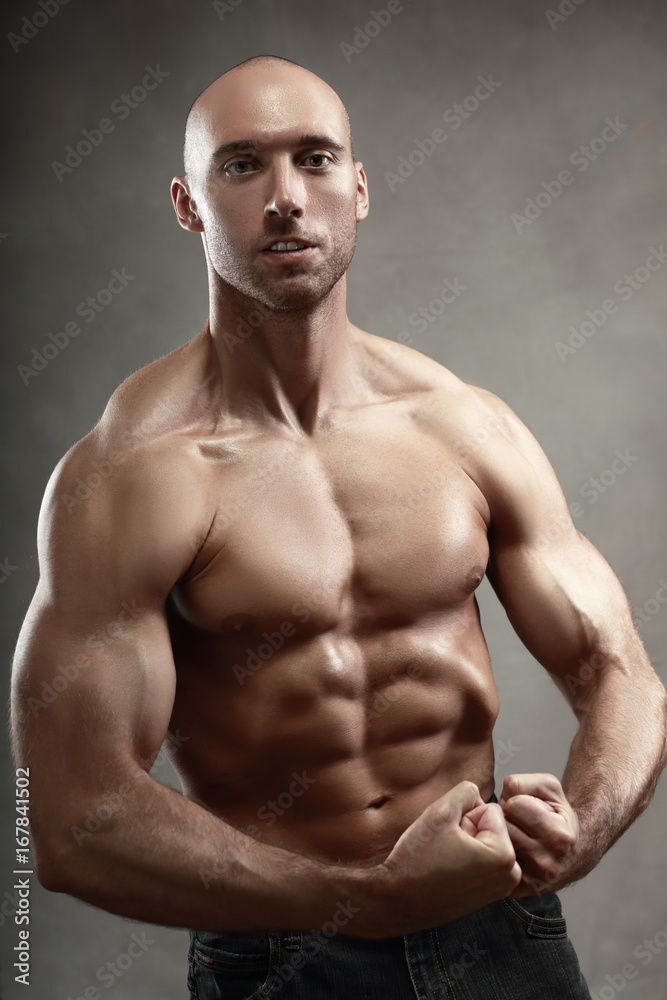 Fototapeta premium man topless show thumbs up