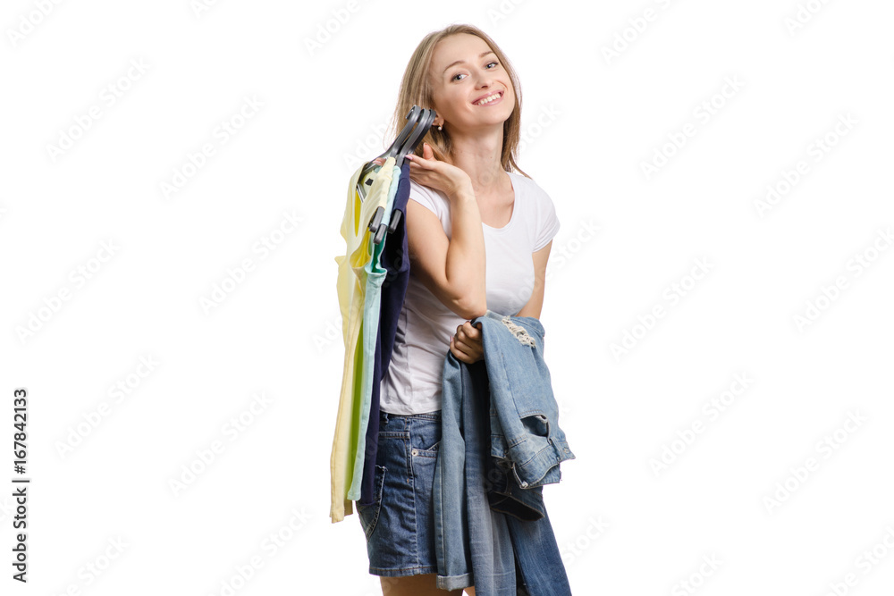 Beautiful young girl with things jeans t-shirt and with a sale Beautiful young girl with things jeans t-shirt and with a sale