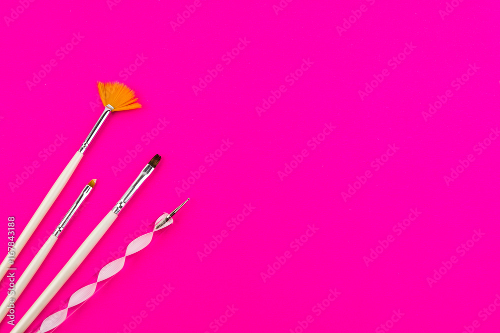 Nail Art Brushes On Pink Background Closeup Nail Art Brushes On Pink Background Closeup