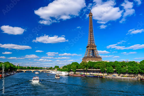 Paris Eiffel Tower and river Seine in Paris, France. Eiffel Tower is one of the most iconic landmarks of Paris.