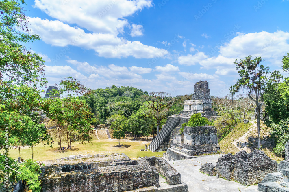 view over Maya pyramids and temples in national park Tikal in Guatemala