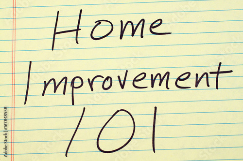The words "Home Improvement 101" on a yellow legal pad