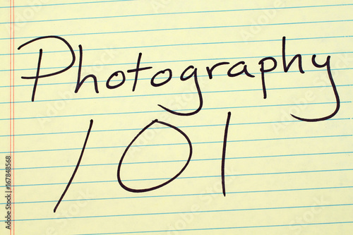 The words "Photography 101" on a yellow legal pad