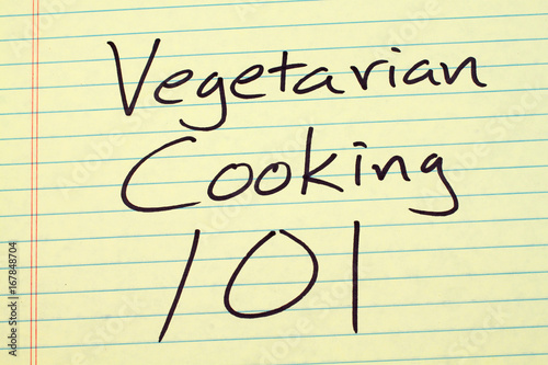 The words "Vegetarian Cooking 101" on a yellow legal pad