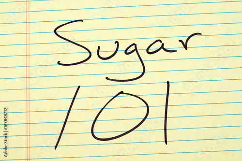 The words "Sugar 101" on a yellow legal pad