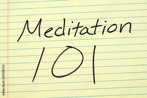 The words "Meditation 101" on a yellow legal pad