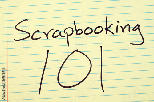 The words "Scrapbooking 101" on a yellow legal pad