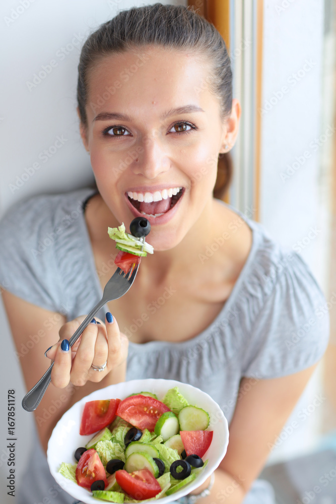 A beautiful girl eating healthy food. Beautiful girl A beautiful girl eating healthy food. Beautiful girl
