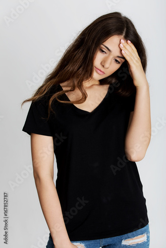 Young woman with headache.