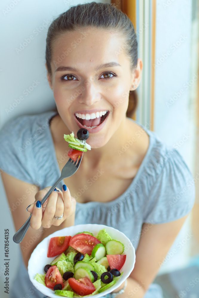 A beautiful girl eating healthy food. Beautiful girl A beautiful girl eating healthy food. Beautiful girl