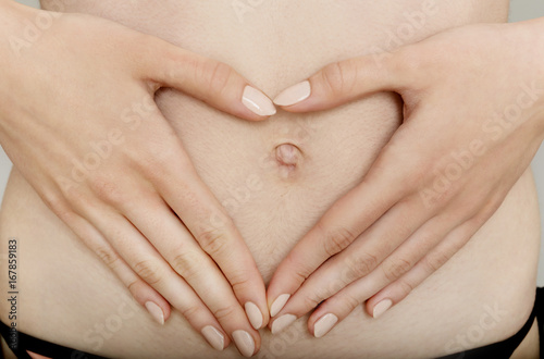 Photos Heart symbol on belly