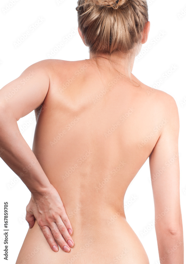 Woman from the back, backache, pain concept Woman from the back, backache, pain concept