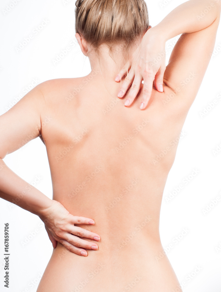 Woman from the back, naked body, pain concept Woman from the back, naked body, pain concept