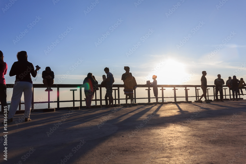 Fototapeta premium Many tourists watch the morning sunrise on the mountain.