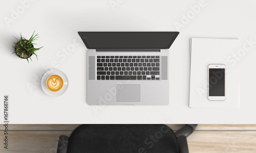 Modern workplace with laptop and smartphone copy space on white table background. Top view. Flat lay style.