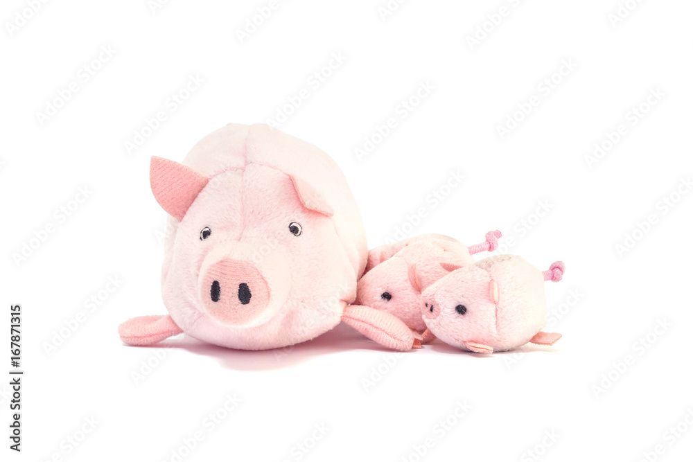 Closeup cute pink pig doll with little pig isolated on white background Closeup cute pink pig doll with little pig isolated on white background