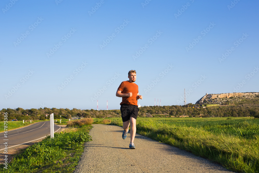 fitness, sport, people and lifestyle concept - Man running outdoor fitness, sport, people and lifestyle concept - Man running outdoor