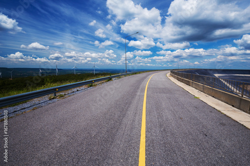 asphalt road with blue sky