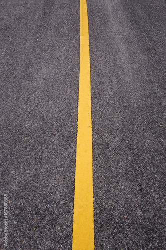 asphalt road with yellow line © geargodz