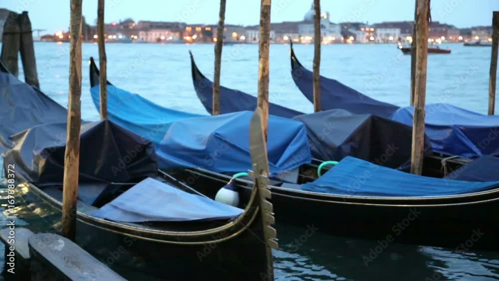 Gondolas on the pier in Venice. Italy. Gondolas on the pier in Venice. Italy.