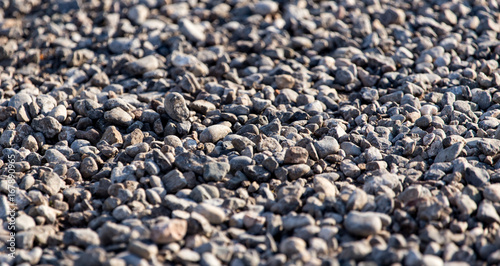 Crushed stone on the road as a background