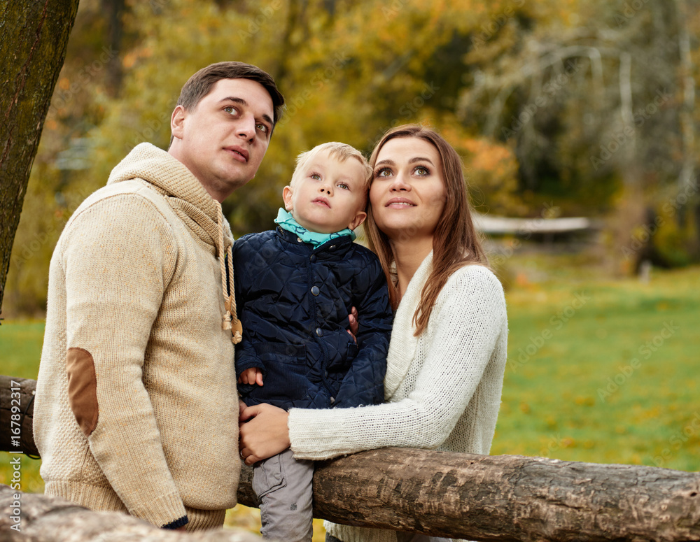 Fototapeta premium Little boy with parents