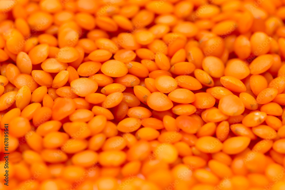 Red lentils as background. macro