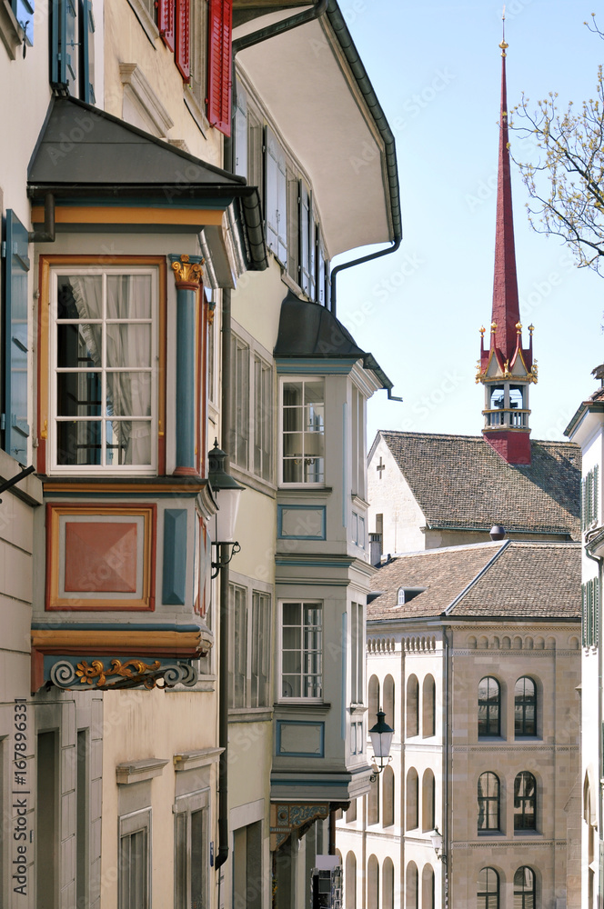 Zurich old narrow street with beautiful ancient bay windows, Switzerland.