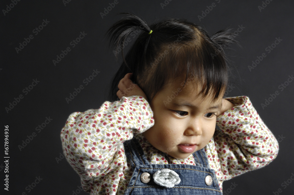 Portrait of a chinese girl on black background Portrait of a chinese girl on black background