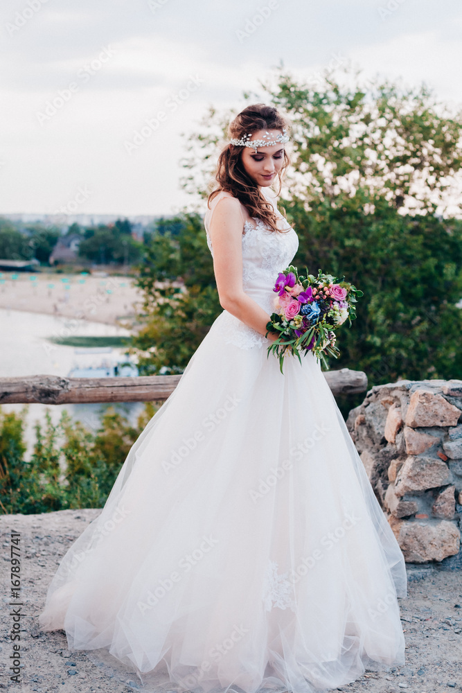 Beautiful bride in a light and airy wedding dress Beautiful bride in a light and airy wedding dress