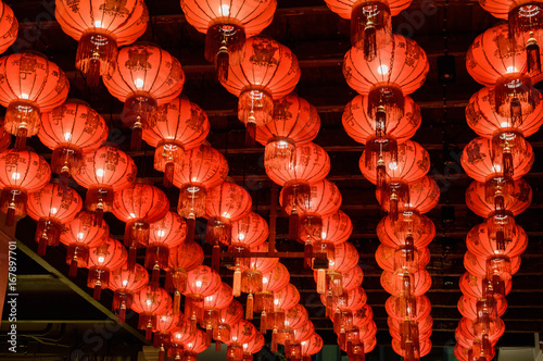 Red Chinese Paper Lanterns decoration taken at night walking street in bangkok, Thailand photo