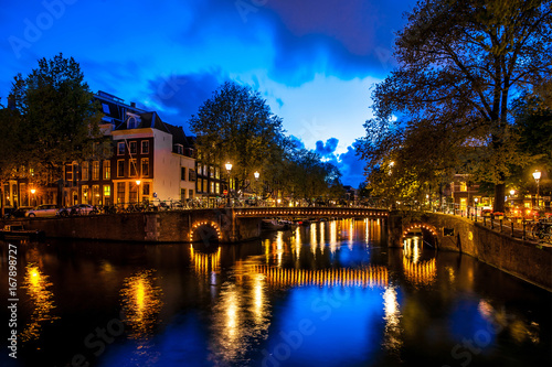 Night shot of Amsterdam canals city view, Netherlands