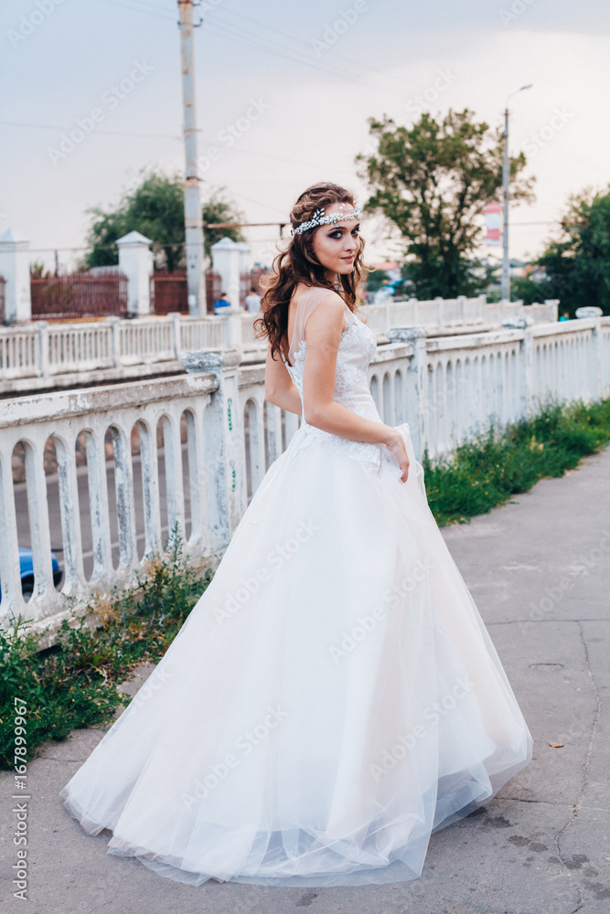 Beautiful bride in a light and airy wedding dress Beautiful bride in a light and airy wedding dress
