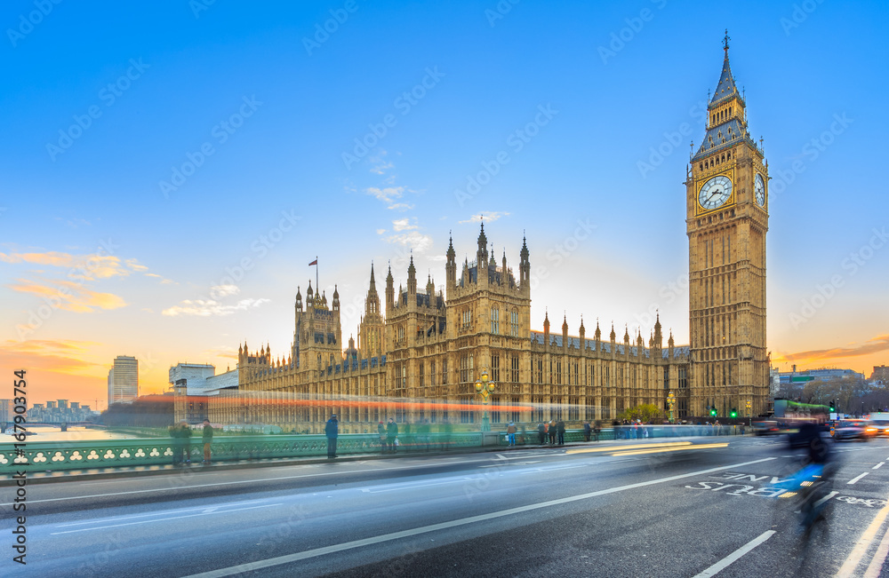 LONDON – DECEMBER 5, 2014: Big Ben and Palace of Westminster, Westminster Bridge on River Thames in London landmark, UK. UNESCO World Heritage Site. Long exposure image at sunset & twilight