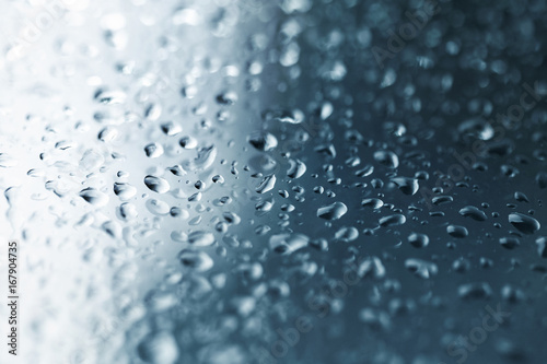 Rainy day, water drops on the flooring