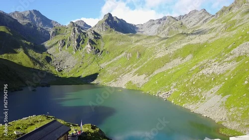 Fly over mountain lake, Switzerland