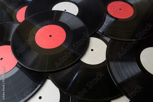 Many vinyl discs red and white label