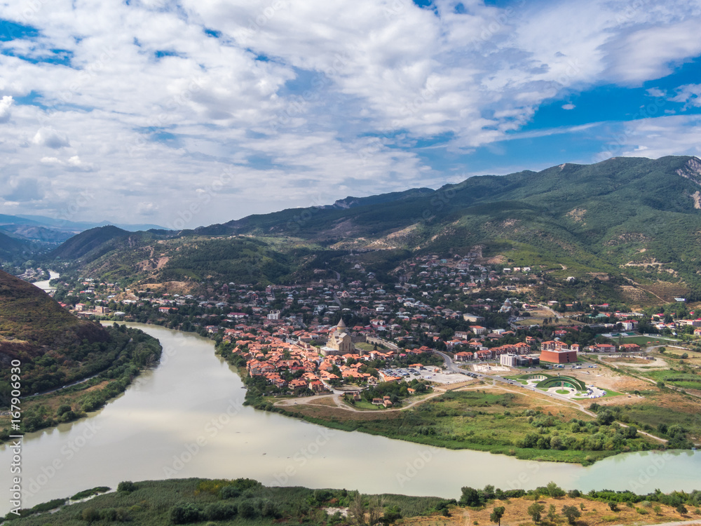 The Top View Of Mtskheta, Georgia, The Old Town Lies At The Confluence Of The Rivers Mtkvari And Aragvi. Svetitskhoveli Cathedral, Ancient Georgian Orthodox Church, Unesco Heritage In The Center.