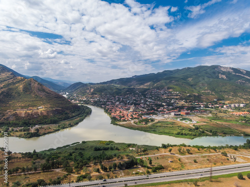 The Top View Of Mtskheta, Georgia, The Old Town Lies At The Confluence Of The Rivers Mtkvari And Aragvi. Svetitskhoveli Cathedral, Ancient Georgian Orthodox Church, Unesco Heritage In The Center.