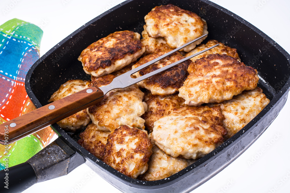 Fried chopped cutlets in frying pan Fried chopped cutlets in frying pan
