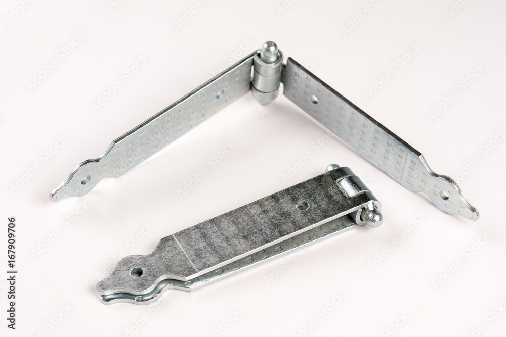 Metal door hinges isolated over white background with copy space Metal door hinges isolated over white background with copy space