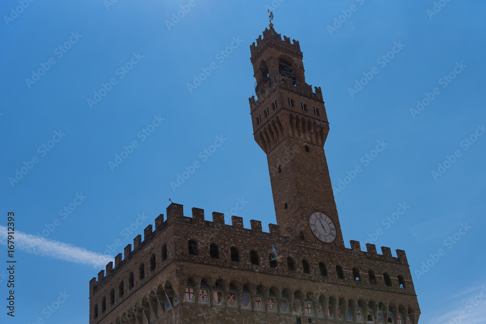 Fototapeta premium Detail of Facade of Old Palace called Palazzo Vecchio at the Piazza della Signoria in Florence, Tuscany, Italy