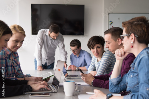 Group of young people meeting in startup office