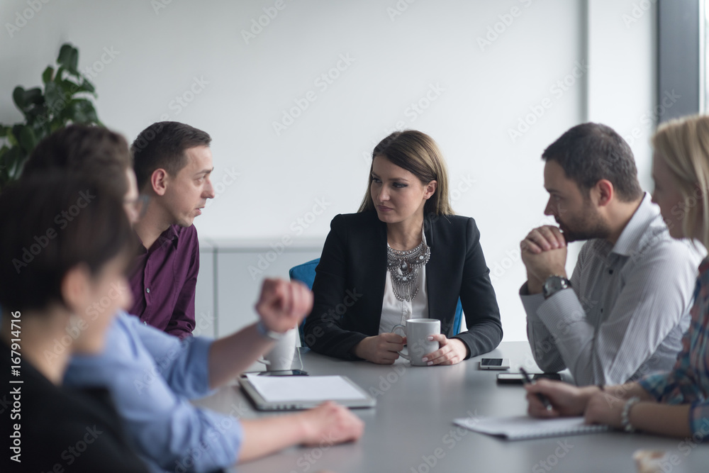 Group of young people meeting in startup office Group of young people meeting in startup office